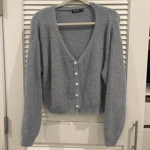 Blue fuzzy pajama set with fake pearl buttons